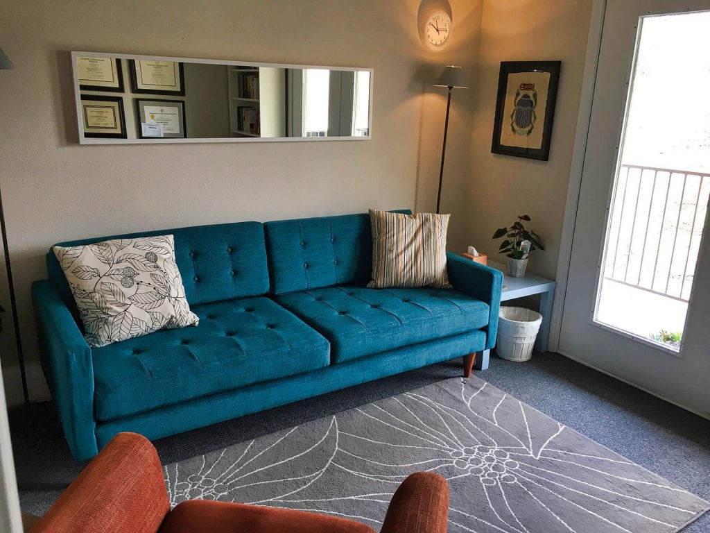 therapist office with blue couch